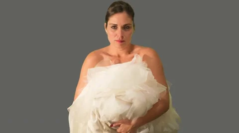 Bride running away and holding her dress. Stock Footage 43161427