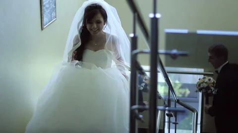 Bride runs away Stock Footage 32475625