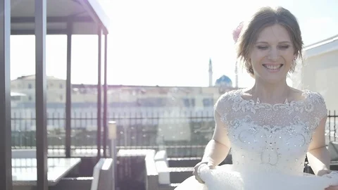 The Bride Runs to the Camera and Waves her Hand Stock Footage 123518130