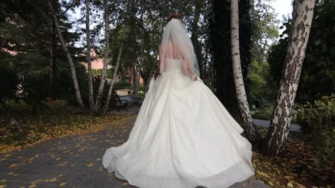 The bride runs in a white dress Stock Footage 143250488