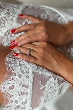 Bride in silk robe at wedding preparations Stock Photos