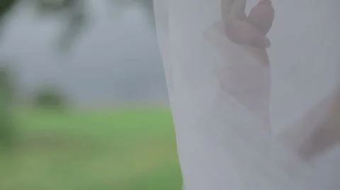 Bride sitting on a swing Stock Footage 56575213