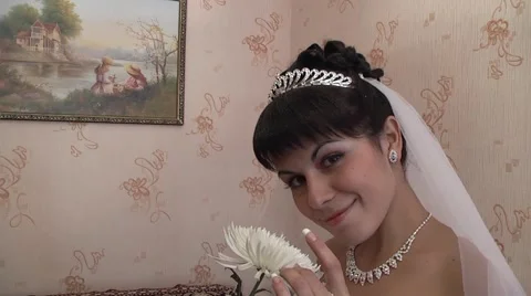 Bride smelling the flowers Stock Footage 1053002