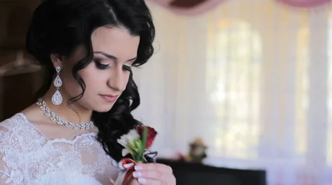 Bride smelling wedding bouquet Stock Footage 63869448