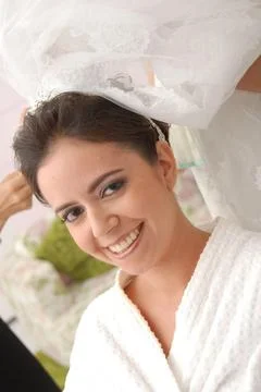 Bride smiling before the wedding Stock Photos
