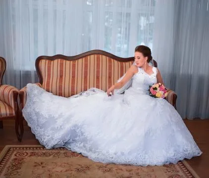 Bride on sofa Stock Photos