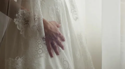 Bride stand by the window 17a Stock Footage 58288006