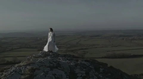 Bride standing on cliff Video stock 38834060