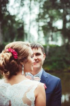 The bride is standing in profile Stock Photos