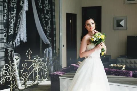 Bride standing in the room Stock Photos