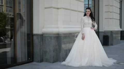 A bride is standing on the street Video stock 97847030