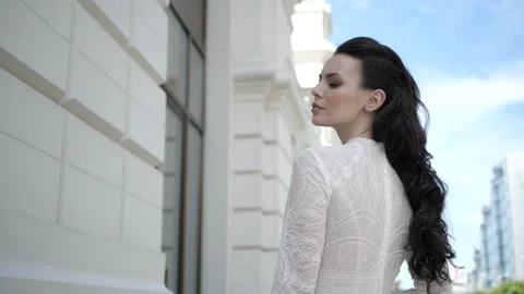 A bride is standing on the street Stock Footage 97847978