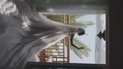 Bride standing at the window Vidéo 224128976