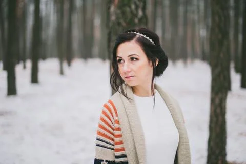 Bride standing in winter forest Stock Photos