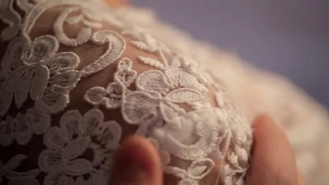 Bride stands back to camera, groom strokes on shoulder on wedding day Stock Footage 74954449