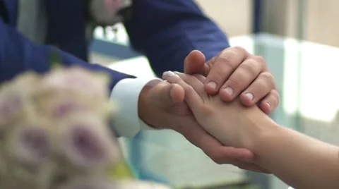 Bride stroking hands of the bride. slow-motion Stock Footage 56319840