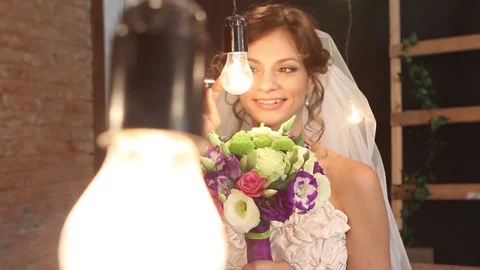 Bride in the studio on a background of lights  Stock Footage 75161418