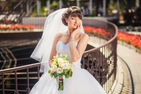 Bride in summer park Stock Photos