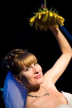 Bride with sunflower at night Stock Photos