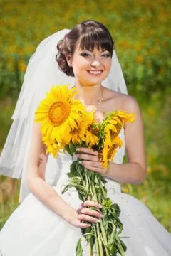Bride with sunflowers Stock Photos