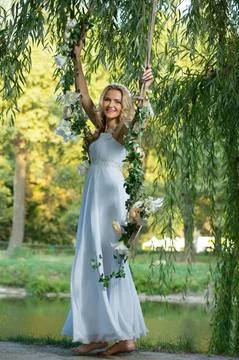 Bride on a swing Stock Photos
