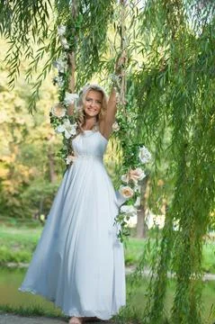 Bride on a swing Stock Photos