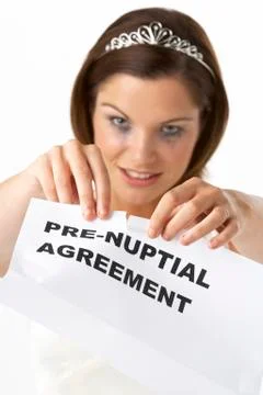 Bride Tearing Up Pre-Nuptial Agreement Stock Photos