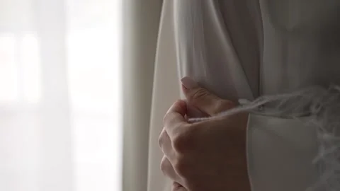 Bride tenderly hugs herself Stock Footage 302309809