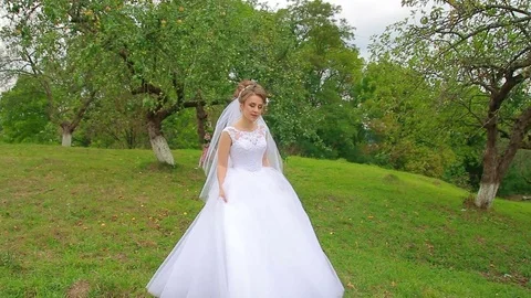 Bride turns and looks forward Stock Footage 75029437