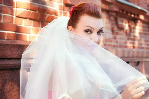 Bride in veil close up outside Stock Photos