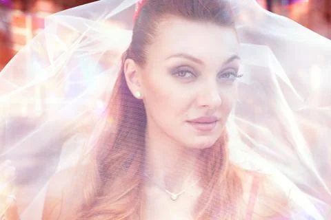 Bride in veil close up outside Stock Photos