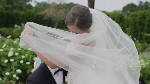 Bride in a veil with a covered face Stock Footage 103950970
