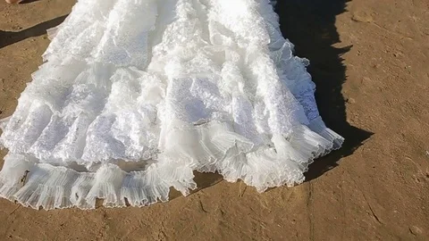 Bride walk on the beach Stock Footage 72324116
