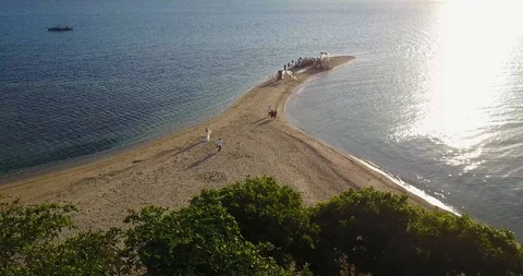 Bride walking down the Beach Stock Footage 106551340
