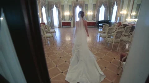 Bride walking on luxurious hall of the old castle. Stock Footage 47841739