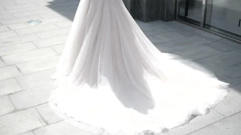 A bride is walking on the street Video stock 97846229
