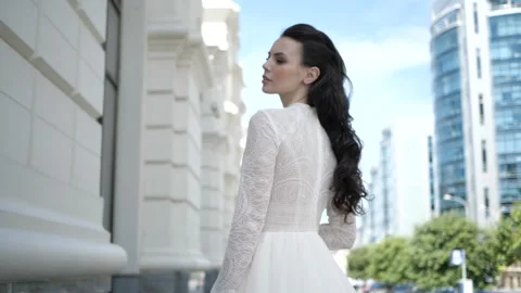 A bride is walking on the street Video stock 97847919