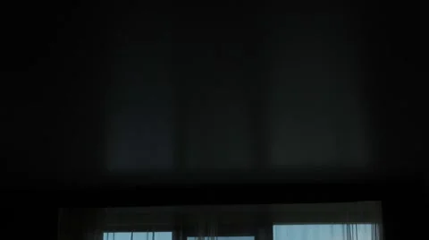 The bride walks to the window and opens the curtains. Stock Footage 65331594