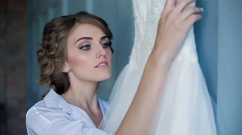 Bride is Watching a Wedding Dress Stock Footage 66507306