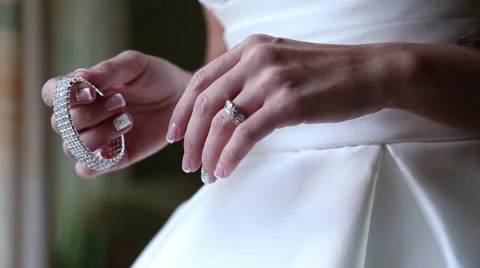 The bride wears a bracelet Stock Footage 57108341