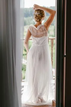 Bride in wedding boudoir view from the back Stock Photos
