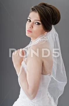 Bride in wedding dress in studio shooting Stock Photos
