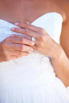Bride, wedding ring and hand with diamond, jewellery and promise of commitment 스톡 사진