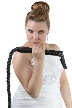 Bride with whip Stock Photos
