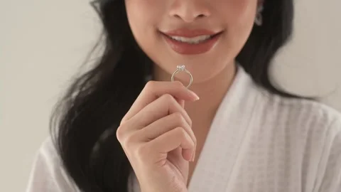 Bride in White bathrope with elegant diamond ring preparing for wedding day.. Stock Footage 280205437
