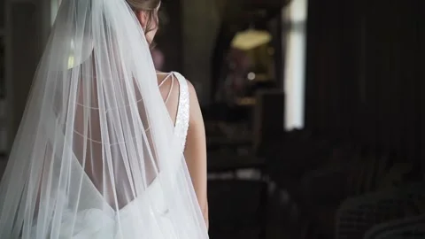 Bride in white dress with bare back Stock Footage 170794366