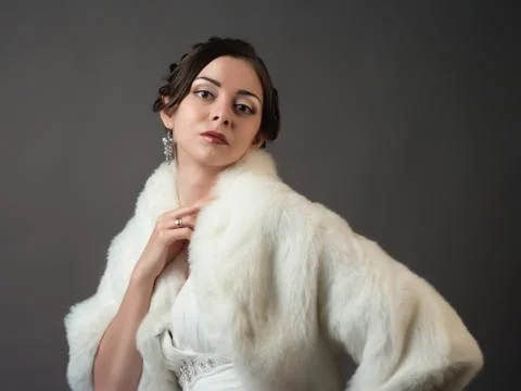 Bride in a white fur coat. Beautiful woman Stock Photos