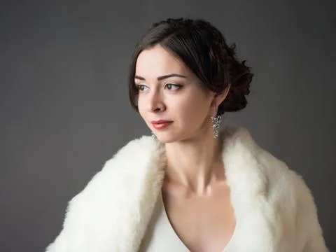 Bride in a white fur coat. Beautiful woman Stock Photos