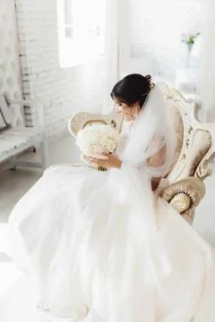 Bride in white room Stock Photos