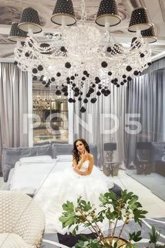 Caucasian female costume designer works on wedding gown - Stock Image -  Everypixel